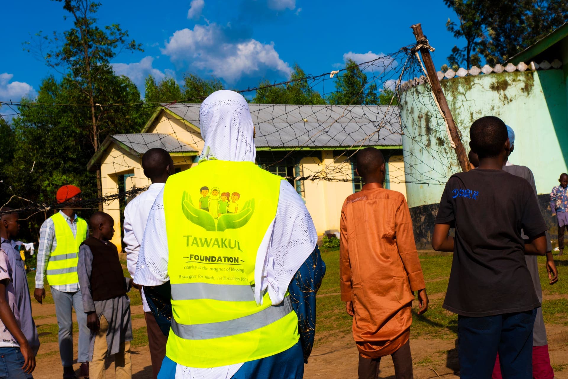 Tawakul Foundation volunteer with children at Ikhlas Education Center